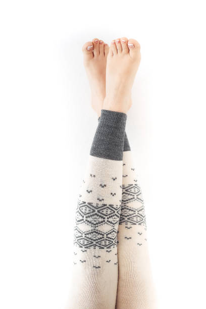 istock women's legs in warm wool leggings. 1294473933