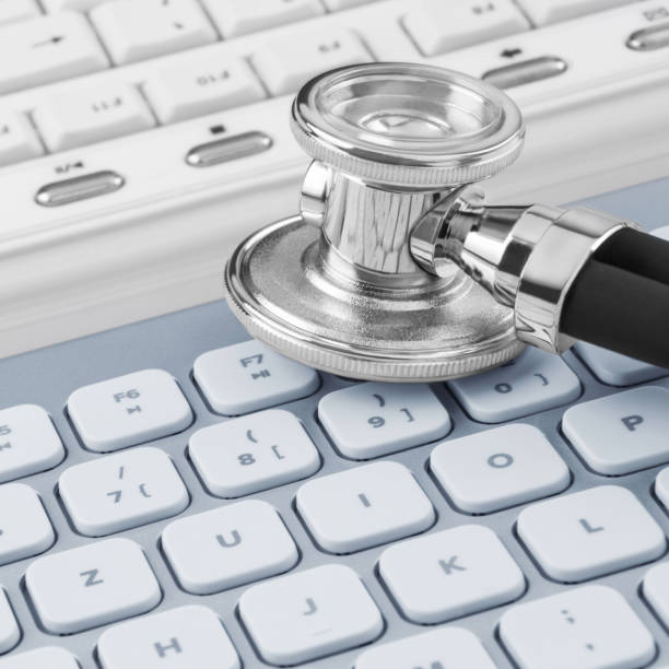 istock Online medicine with stethoscope and PC keyboard 1294475182