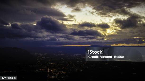 Sunset Over Salève Lake Geneva And Geneva Stock Photo - Download Image Now - Abstract, Atmosphere, Atmospheric Mood