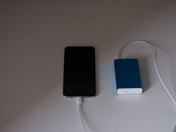 istock Powerbank and Mobile Phone at the Charge 1294476074