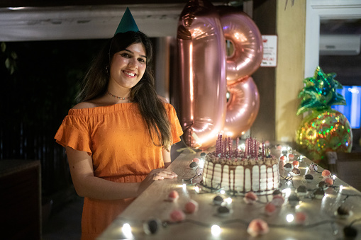Portrait of a teenager woman on her birthday party