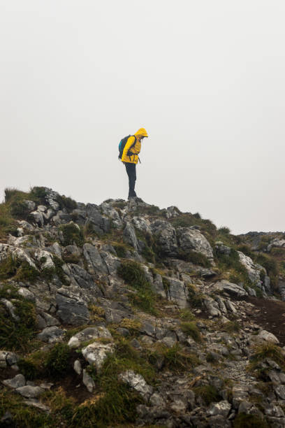istock Tourist hiking in mountains 1294478535