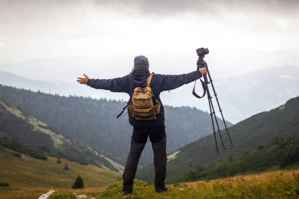 istock Hiker photographing landscape 1294478537