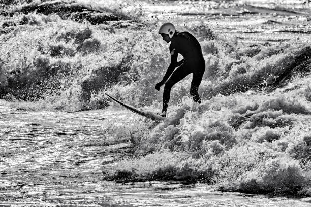 The Hawaiian Island of Oahu on February 15, 2020: Man surfing on the Banzai Pipeline located on the North shore of Oahu