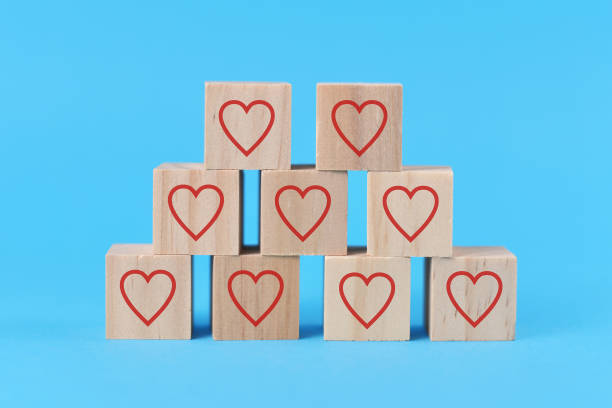 istock Wooden cubes with red hearts 1294481808