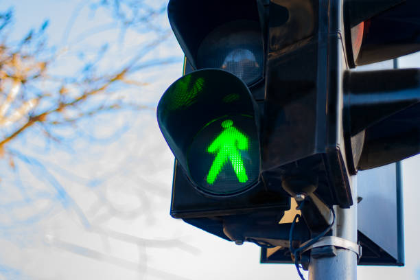 istock traffic light with the image of a  green man 1294481823