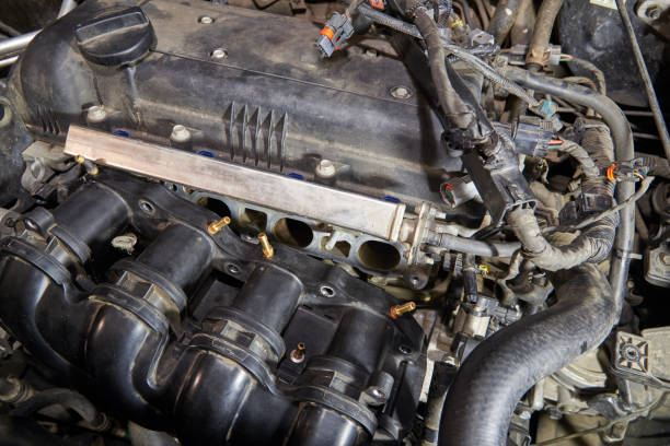 istock Car engine, intake manifold, connection of LPG injectors. 1294481943