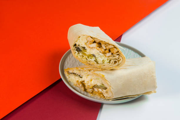 istock Close up to Gyros roll wrapped in thin lavash bread. 1294483232