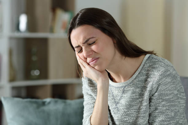 istock Woman complaining suffering toothache at home 1294484064
