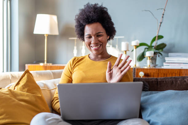 istock Woman relaxing at home and using laptop 1294484316