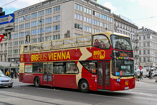 Vienna, Austria - November 2019:  Double deck tourist sightseeing bus operated by Big Bus Vienna driving on a street in Vienna city centre.