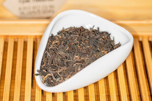 istock Chinese bulk extruded tea ripe Pu Er in Tea presentation vessel 1294487710