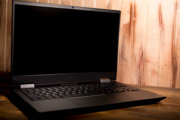 istock Open laptop on wooden desk. 1294488732