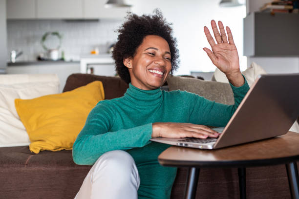 istock Woman at home talking on a video call 1294489674