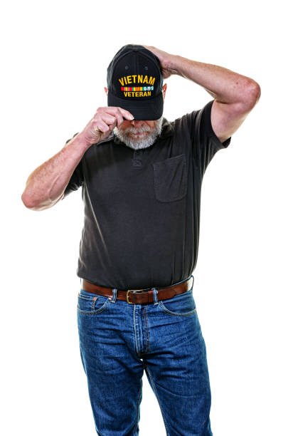 USA Vietnam War Military Veteran Man Looking Down Adjusting Hat