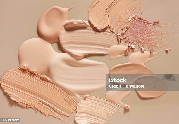 Smudged Makeup Gradient Texture Palette Creamy Matte Concealer Foundation Cc Or Bbcream Powder On White And Beige Isolated Background Stock Photo - Download Image Now