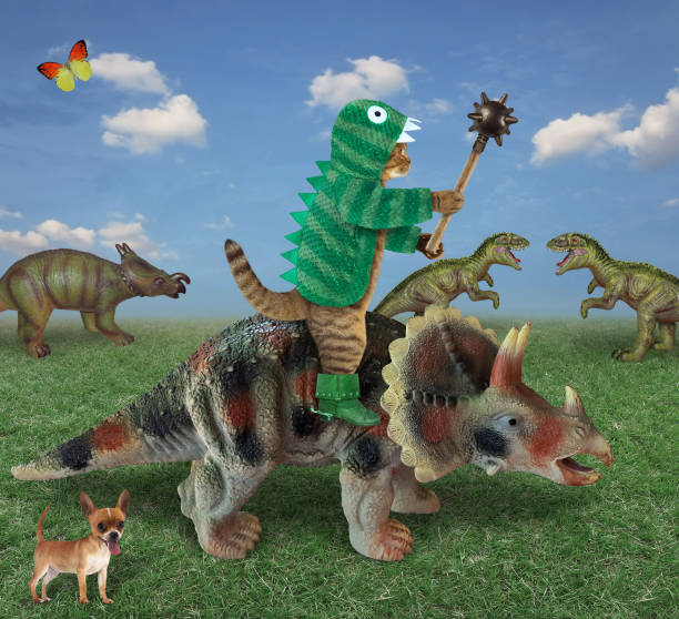 istock Cat in dragon clothing rides dinosaur 3 1294491938