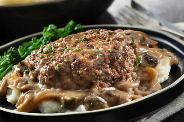 istock Salisbury Steak in a Rich Mushroom and Onion Gravy with Mashed Potatoes 1294492962