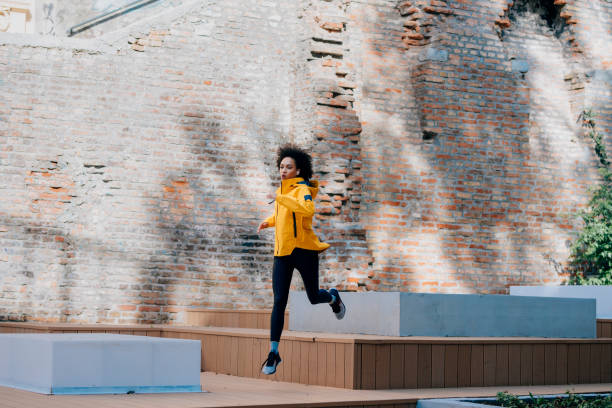 istock Confident Woman Jogging in the Park 1294495541
