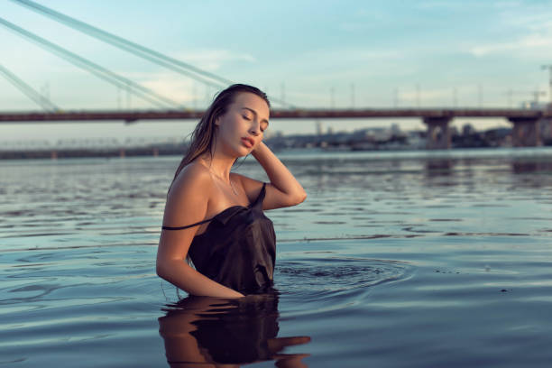 istock Evening photo shoot on the beach by the river 1294496900