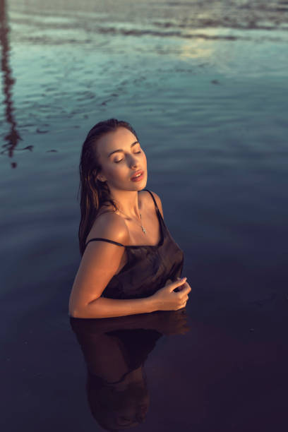 istock Evening photo shoot on the beach by the river 1294497544