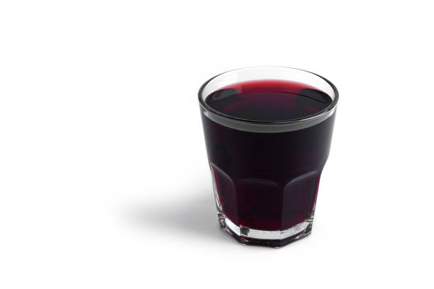 istock Cherry juice in bottle on a white background 1294497856