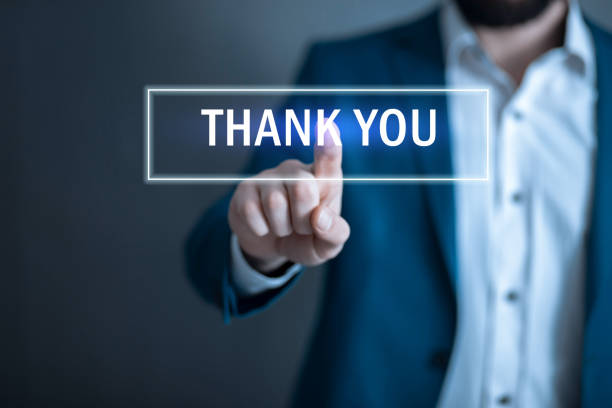 istock man hand thank you text in screen 1294499163