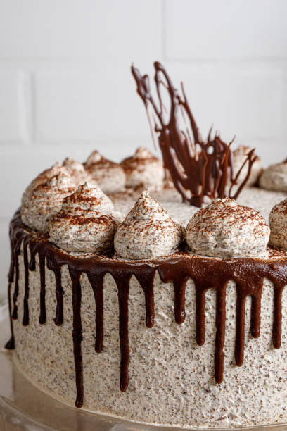 istock Round creamy cake with chocolate and cinnamon. 1294500842