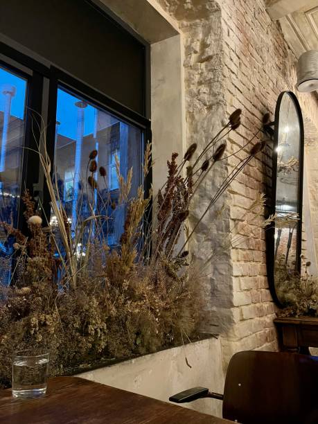 istock window sill with flowers in the evening 1294501114