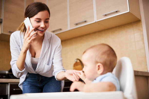 istock Joyful parent playing with her little son 1294501132
