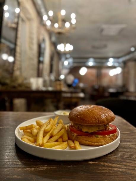 istock hamburger and fries in restaurant 1294501203