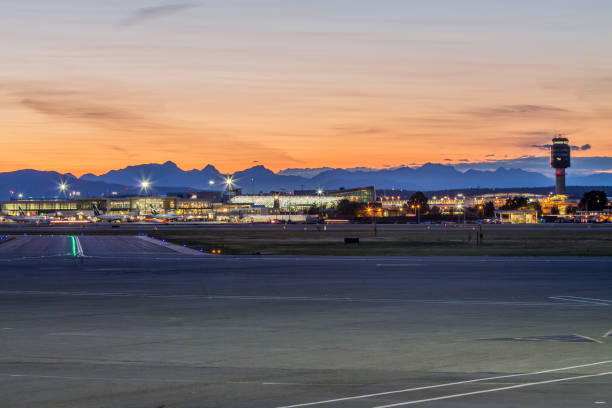 YVR Sunset Beautiful sunset at YVR Vancouver Airport. airports canada stock pictures, royalty-free photos & images