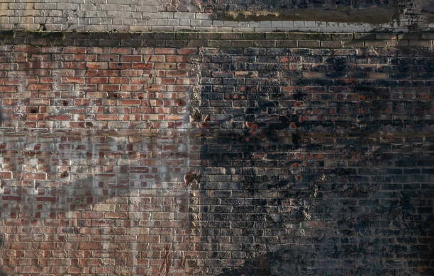 istock Empty Old Brick Wall Texture. Background of the old red and black brick walls. 1294511298