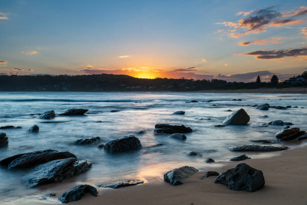 istock Sunset, rocks and the sea 1294520814