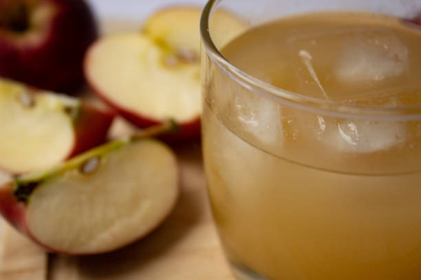 istock Delicious apple juice with ice cubes 1294522639