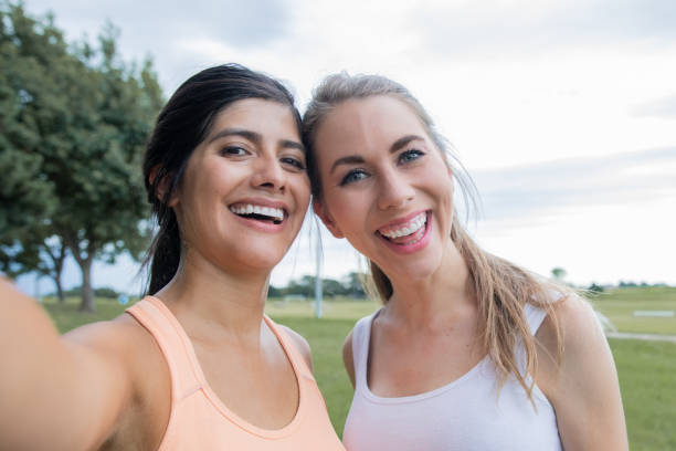 istock Friends smiles together for a selfie 1294529136