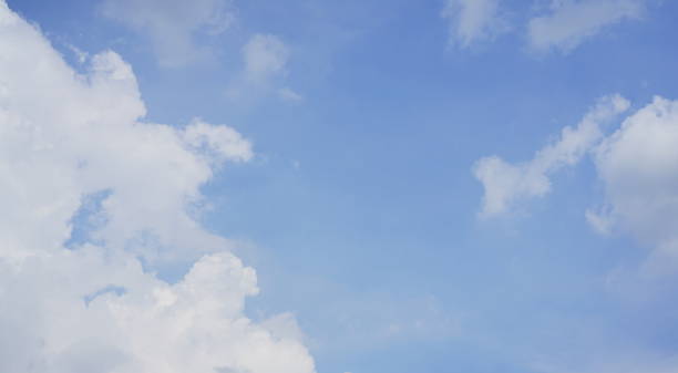 istock Blue sky background with cumulus clouds background 1294531606
