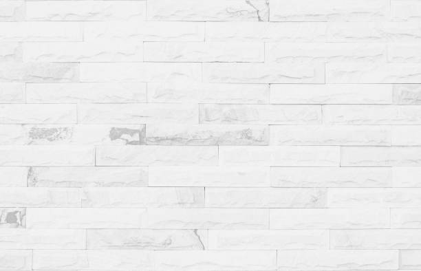 istock White grunge brick wall texture background for stone tile block painted in grey light color wallpaper modern interior and exterior and room backdrop design 1294532316