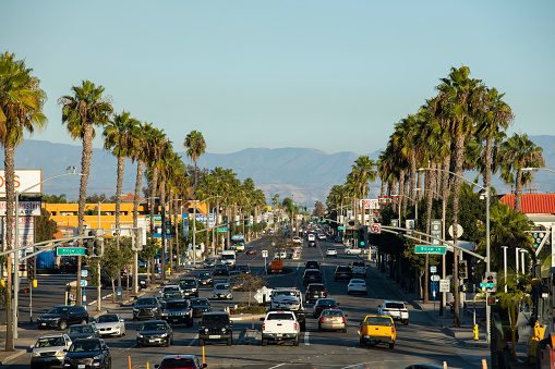 Westminster, California, USA - September 23, 2020: Afternoon traffic streams down Westminster Blvd in the commercial district of Westminster.
