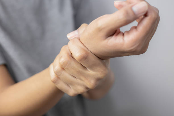 istock Woman suffering from pain in wrist. 1294539461