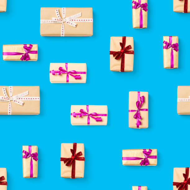 istock Seamless pattern made from gift boxes on blue background presents, gifts minimal concept seamless pattern. Abstract pattern for christmas birthday wedding 1294540156
