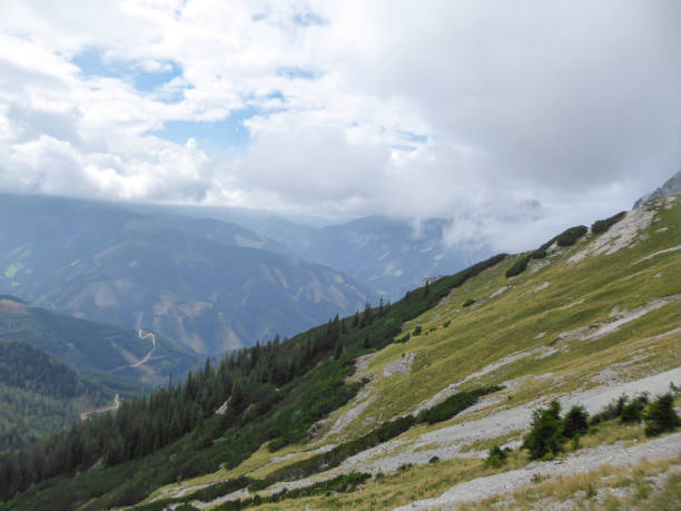 istock Hochkogel - A panoramic view on the Austrian Alps from the Hochkogel peak. Thick clouds above the region. Endless mountain chains 1294542800