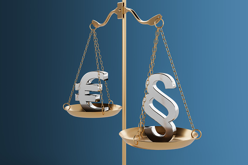 Euro symbol and Law Section Symbol on balance scale against blue background. Corruption and bribery concept. 3D rendering.