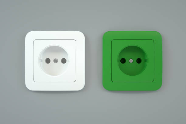 istock Renewable Green Energy, Green Electric Socket on Wall 1294544489
