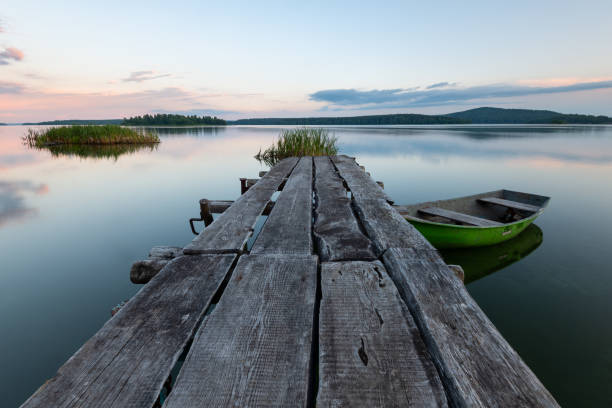 istock old wooden pier on the lake 1294544492
