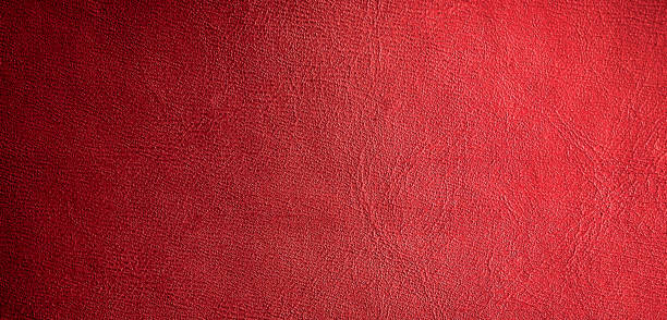 istock red faux leather with visible details. background 1294547917