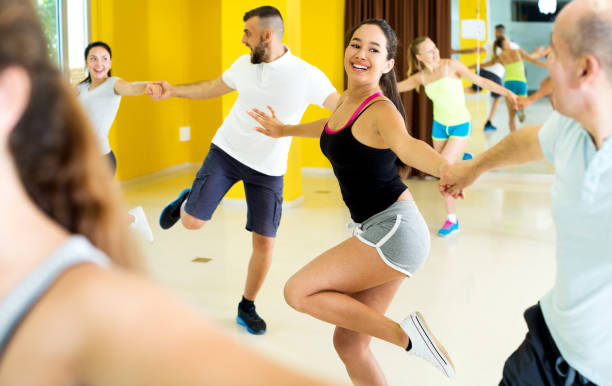istock People dancing rock-and-roll in the hall 1294550084