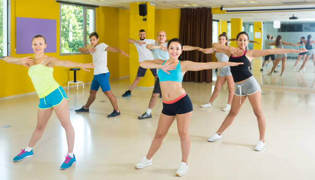istock Happy men and women performing modern dance 1294550802