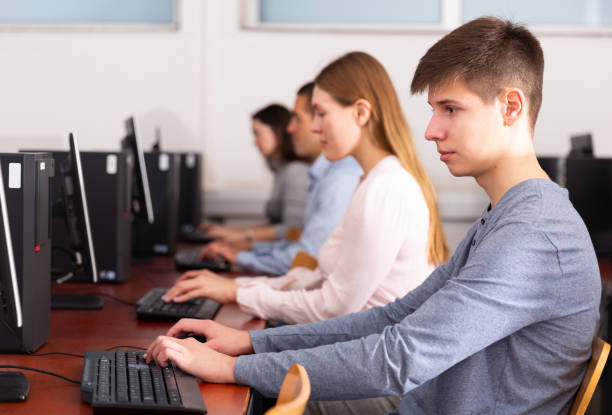 istock Side view of focused business people during daily work in co-working space 1294551214