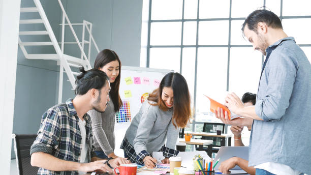 istock Multi Ethnics Teamwork Collaboration Team Meeting Communication concept in Business people Working Together Conference Room. Diversity Partner Business Meeting brainstorming together Businessman Team 1294552557